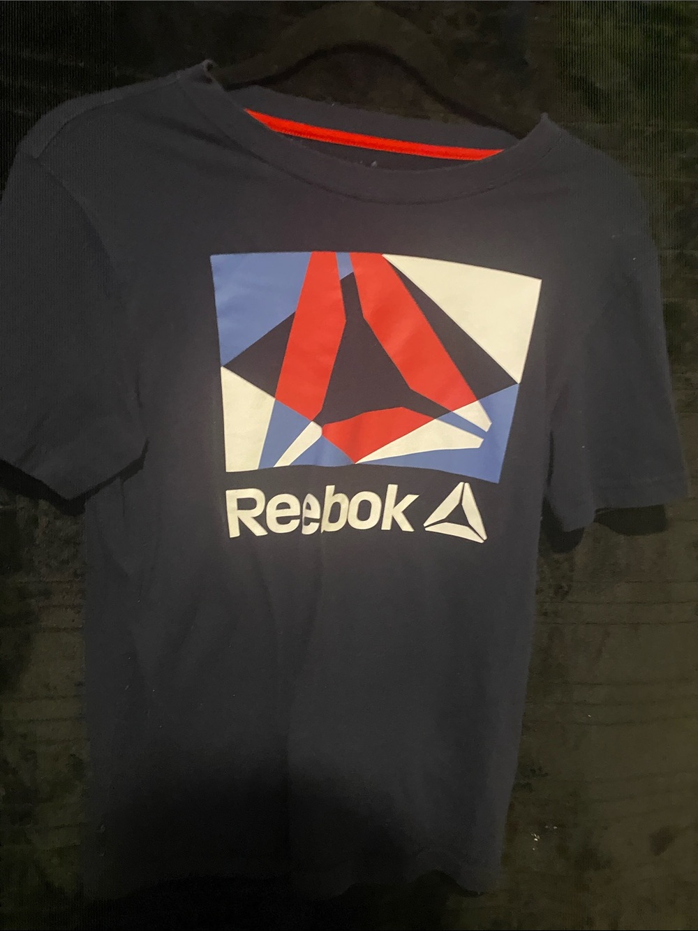 Reebok Navy Tee with Red, White & Blue Geometric Logo